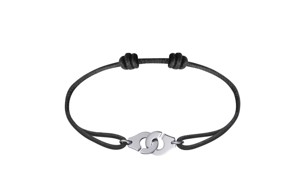 Bracelet Dinh Van Menottes R10 Or Blanc Sur Cordon Daniel Gerard